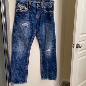 Slightly worn men’s Rock Revival Jeans